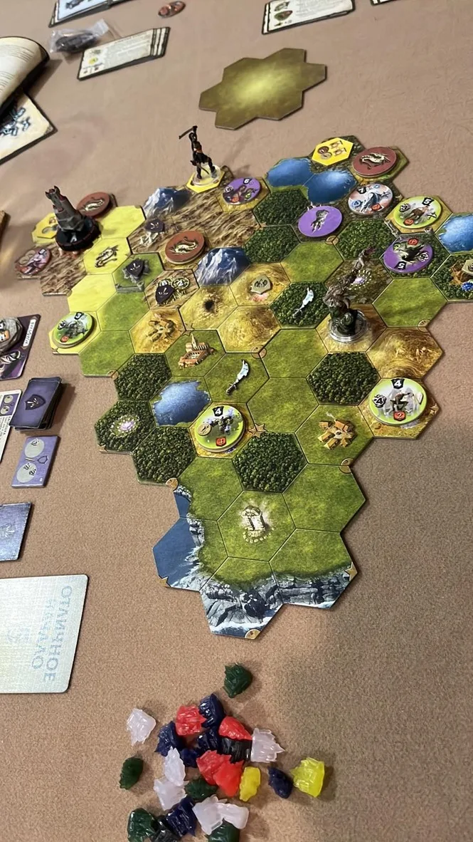Our Mage Knight session: the hex map with hero miniatures and enemy tokens · 1