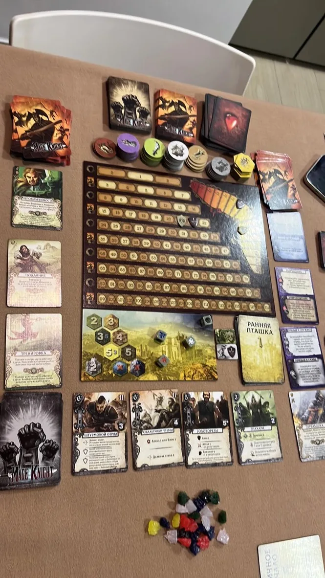 Our Mage Knight session: the hex map with hero miniatures and enemy tokens · 2