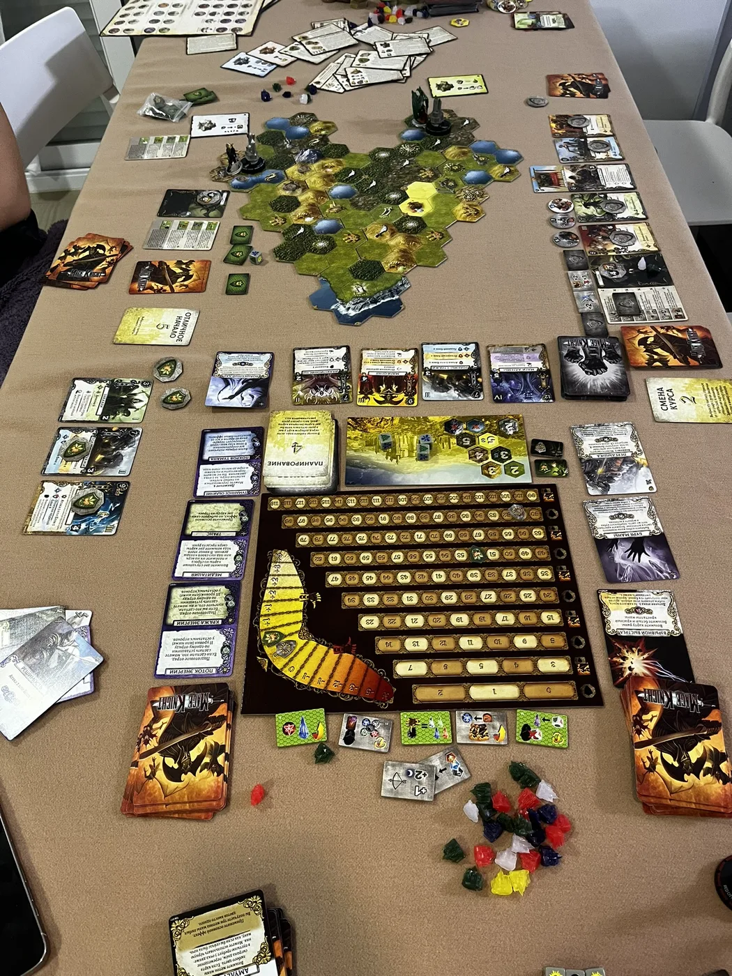 Our Mage Knight session: the hex map with hero miniatures and enemy tokens · 3