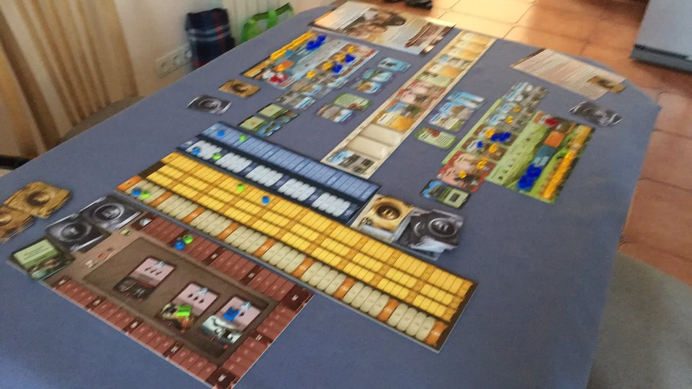Our Through the Ages session: card rows, a civilization board and resource cubes · 2