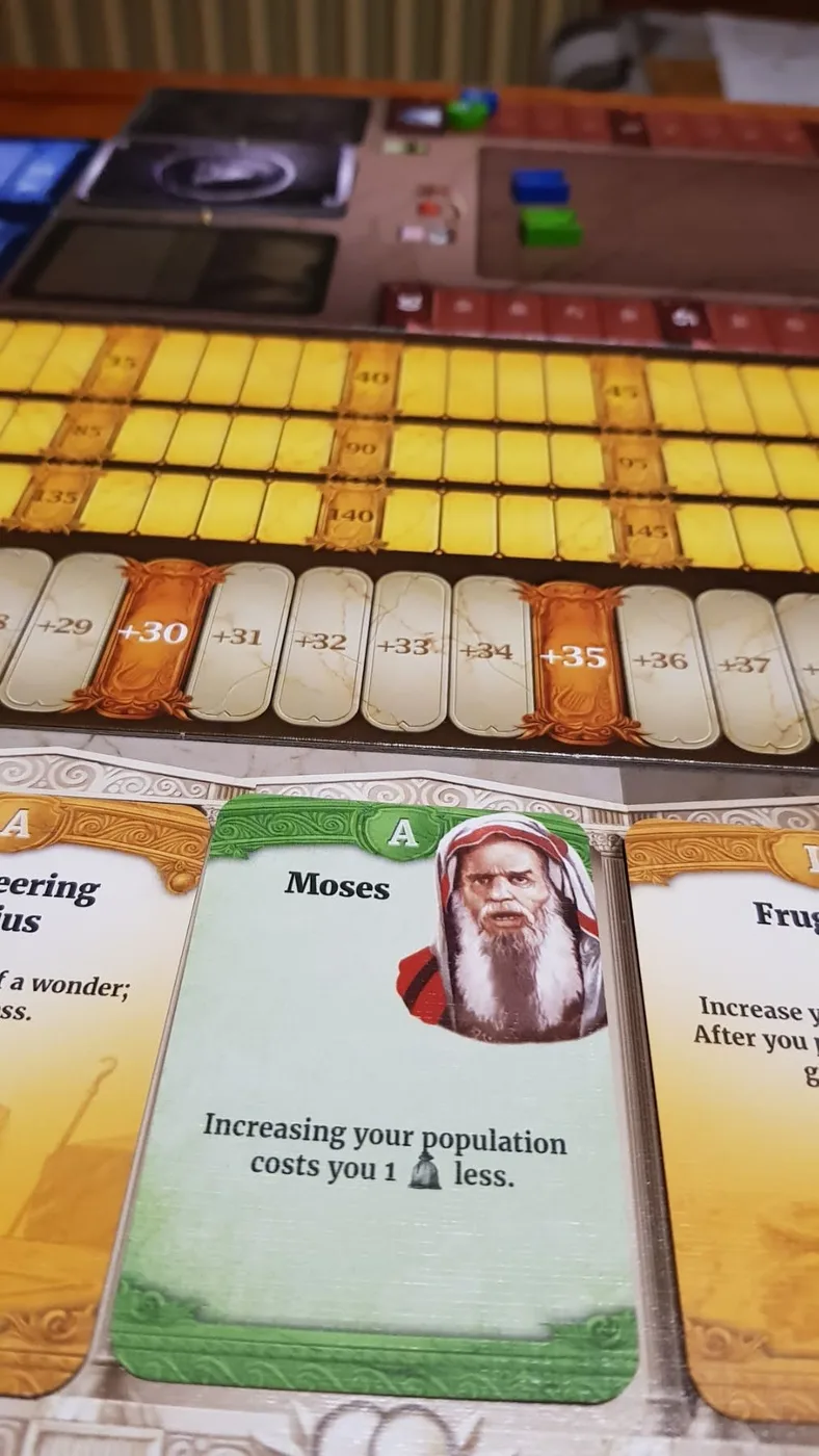 Our Through the Ages session: card rows, a civilization board and resource cubes · 3